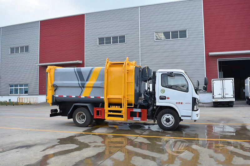 東風(fēng)多利卡D6藍(lán)牌7方側(cè)裝壓縮垃圾車