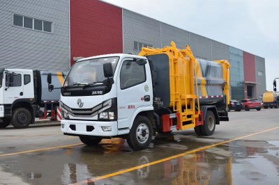 東風(fēng)多利卡D6藍(lán)牌7方側(cè)裝壓縮垃圾車