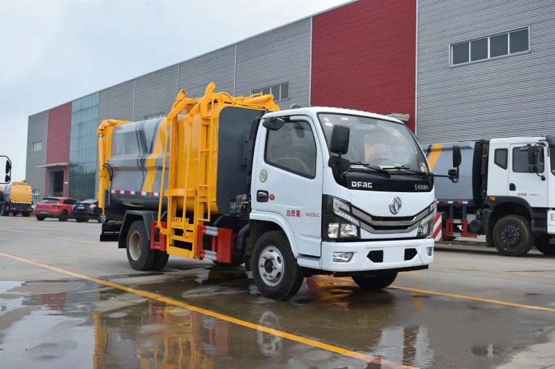 東風(fēng)多利卡D6藍(lán)牌7方側(cè)裝壓縮垃圾車